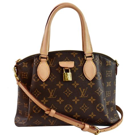 louis vuitton rivoli bag.